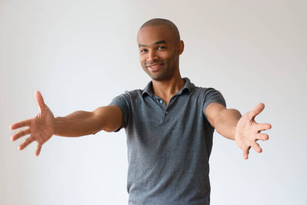 istock Joyful mix raced guy opening hands for hugging 1085204684