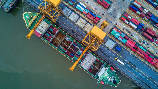 istock Container ship carrying container for import and export, Aerial view business logistic and freight transportation by ship in open sea. 1085207516