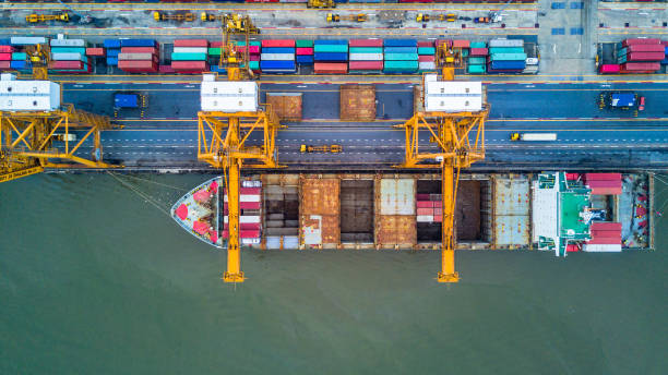 istock Container ship carrying container for import and export, Aerial view business logistic and freight transportation by ship in open sea. 1085207536