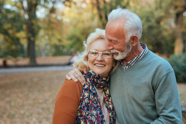istock Senior couple taking a walk in the park 1085208840