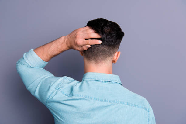istock Rear back view of attractive cool confident content man wearing 1085210552