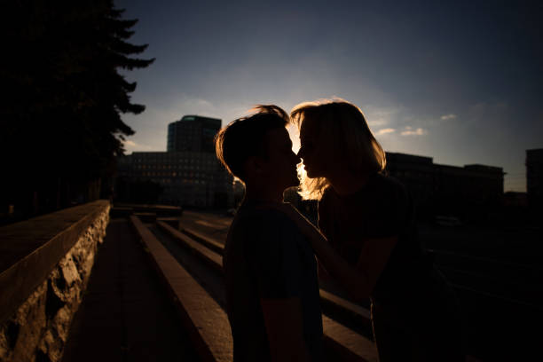 Young man and cute girl in the city