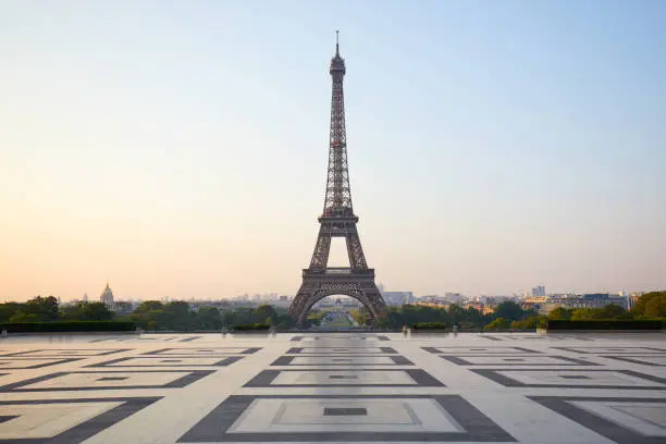 Eiffel tower, empty Trocadero, nobody in a clear summer morning in Paris, France