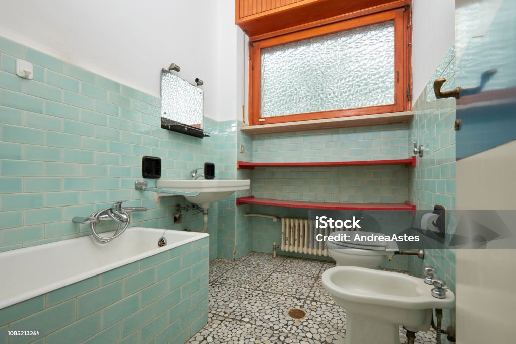 Normal bathroom in old apartment interior Normal bathroom in old apartment interior in Italy Domestic Bathroom Stock Photo