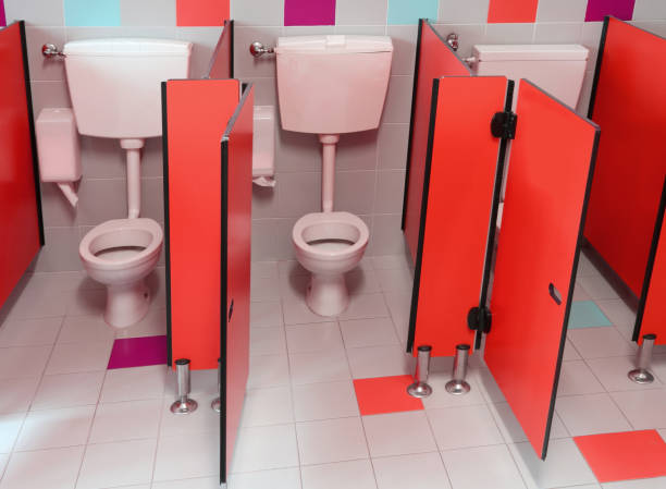 istock small toilets with red doors for children in a kindergarten 1085221332