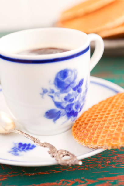 istock Cup of coffee with a Dutch stroopwafel cookie 1085225668
