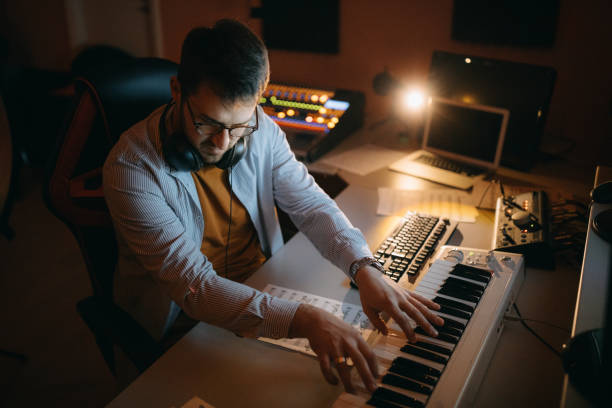 istock Musician composing music in his recording studio 1085226324