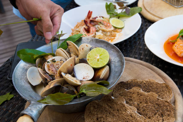 istock Baked Scallop Mussel with Cheese and Basel 1085234744