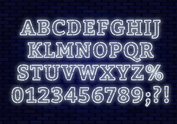 istock Led white font. Bright capital letters with numbers on a dark background. 1085235366
