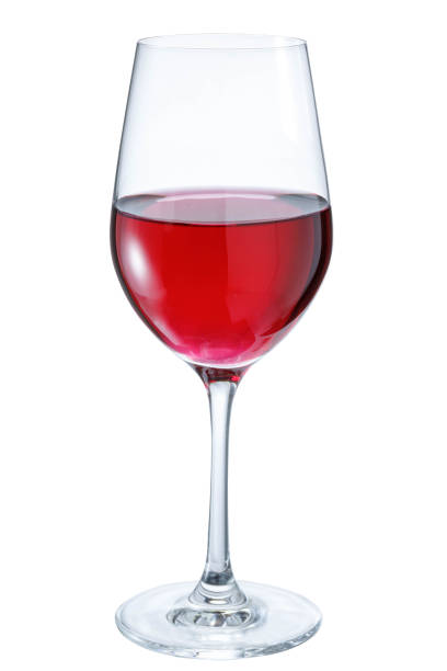 istock Glass of red wine on a white background 1085251246