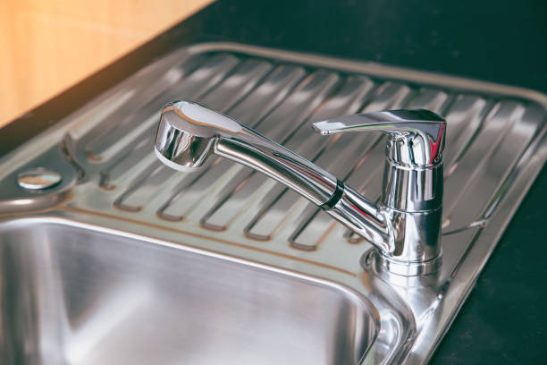 istock Kitchen faucet polished chrome and sink polished chrome. 1085255396