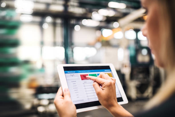 istock An industrial woman engineer in a factory using tablet. 1085267622