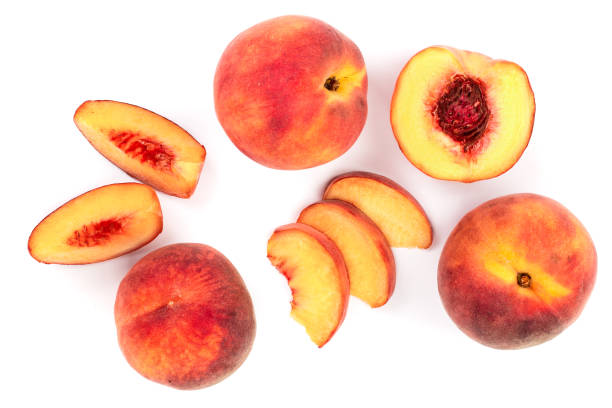 istock ripe peaches isolated on white background. Top view. Flat lay pattern 1085268494