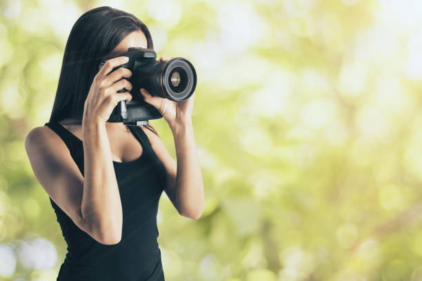 istock Attractive woman taking photo 1085271154