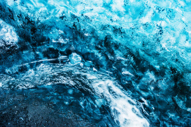 istock Abstract Blue Glacier Ice with Flowing Stream in Vatnajokull Iceland 1085273740