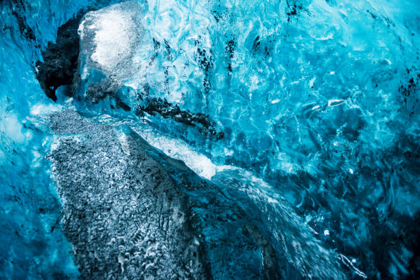 istock Abstract Blue Glacier Ice with Flowing Stream in Vatnajokull Iceland 1085274790