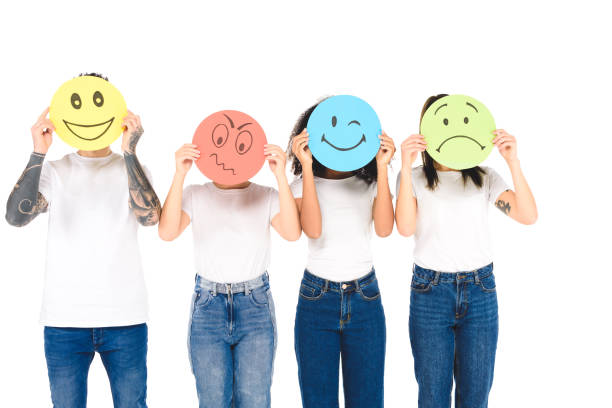 istock multicultural friends in white T-shirts holding round, multicolored signs with different face expressions isolated on white 1085278970