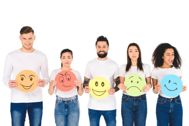 istock multicultural friends with different multicolored signs looking at camera isolated on white 1085279162