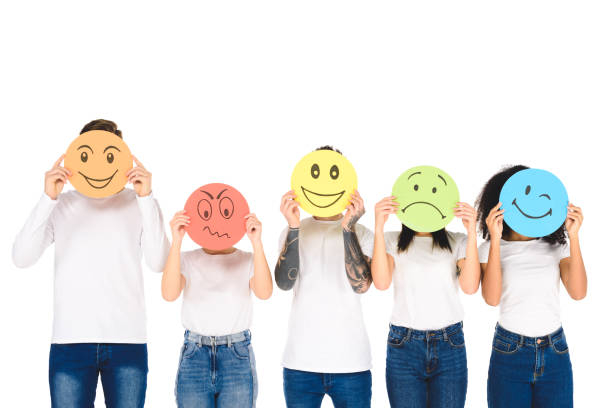 istock young multicultural friends holding colored cards with emotions isolated on white 1085279174