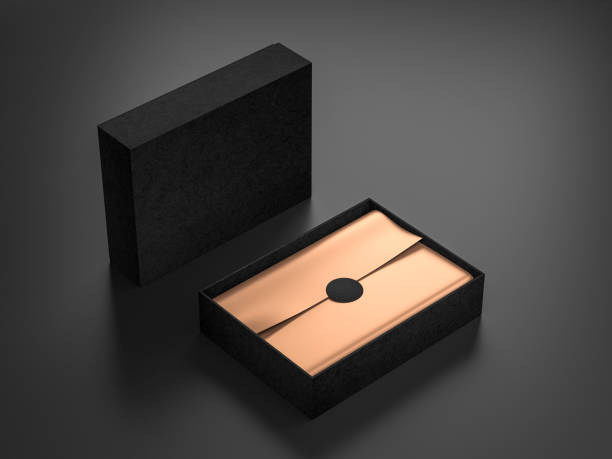 istock Opened Black Box Mockup with golden wrapping paper and label 1085281418