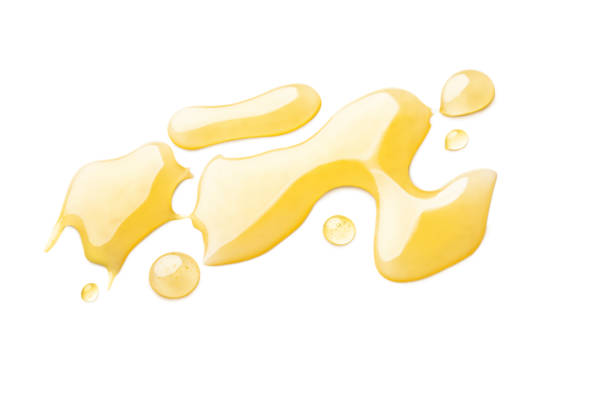 istock Sweet honey smear isolated on white background 1085282886
