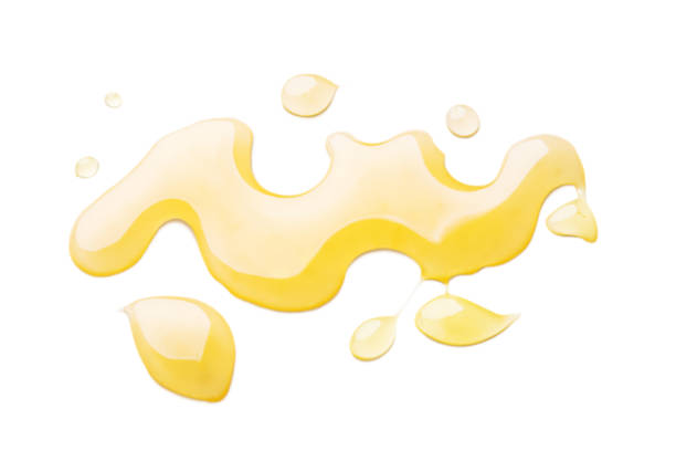 istock Sweet honey smear isolated on white background 1085282898