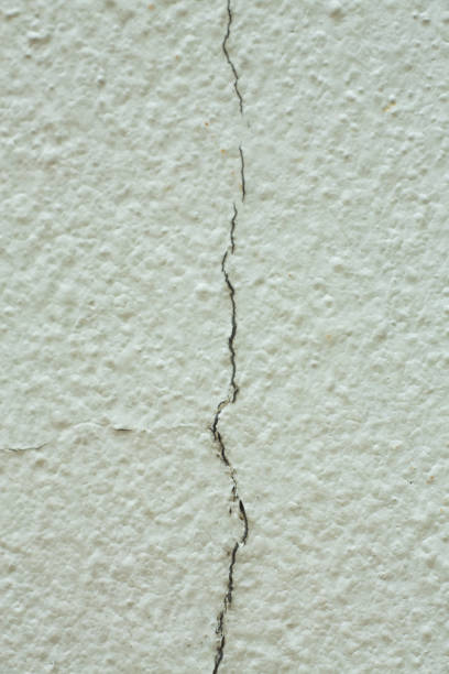 istock Abstract white cracked concrete texture background, Close up & Macro shot, Selective focus 1085284236