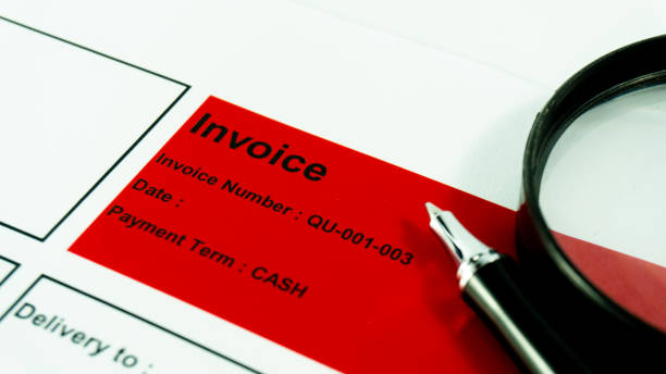 istock Invoice business document  close up with pen background 1085294088