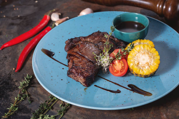 istock veal steak with chili and corn 1085294110