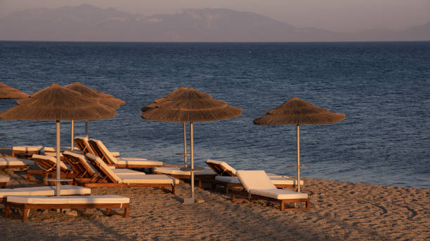 istock Umbrella on the sunset in Kos Dodekanisos island 1085297110