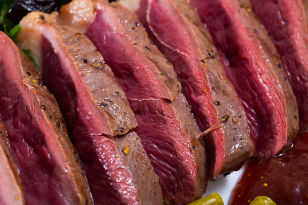 istock Duck breast Magret with prunes 1085299684