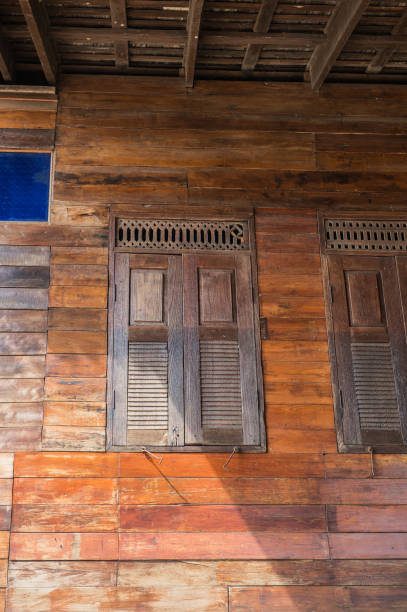 istock old wood window of thai home style design 1085300480