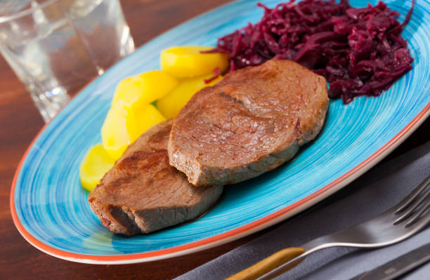 istock Roasted veal hip with boiled potato 1085309638
