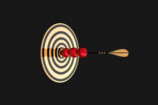 istock golden arrow pierced three red apples 1085313076