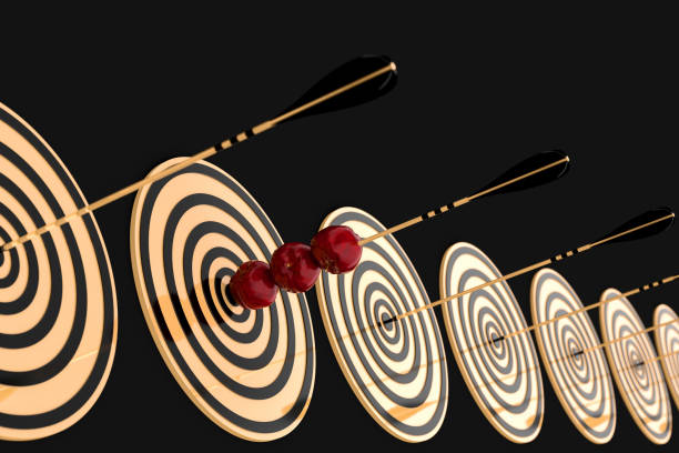 istock golden arrow pierced three red apples 1085313642