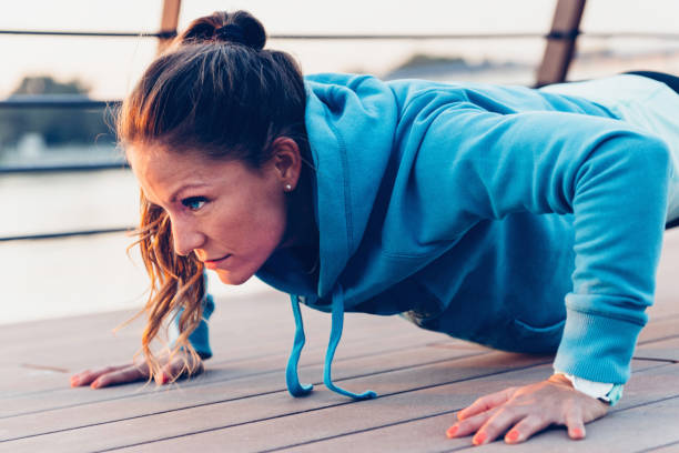 istock Confident Woman Exercising In City 1085313702