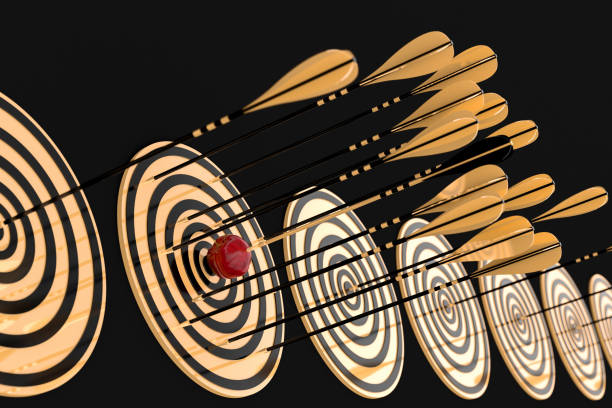 istock many golden arrows  and  red apples 1085313718