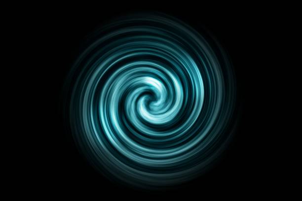 istock Abstract spiral tunnel with teal smoke on black background 1085317988