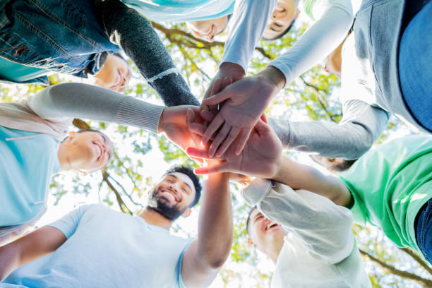 istock Diverse group of people volunteer during community cleanup 1085319128