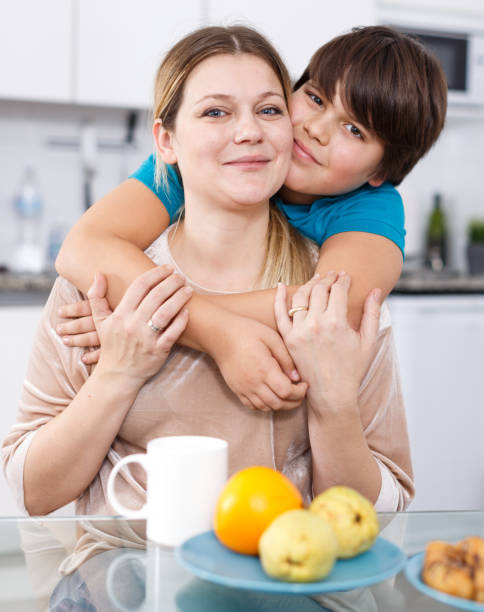 istock Mother and son eating at kitchen 1085322832