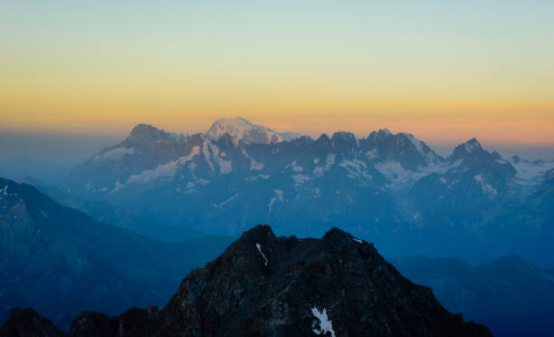 A wide angle view of dawn over the Alps, Mont Blanc and the Chamonix valley occupy the scene.