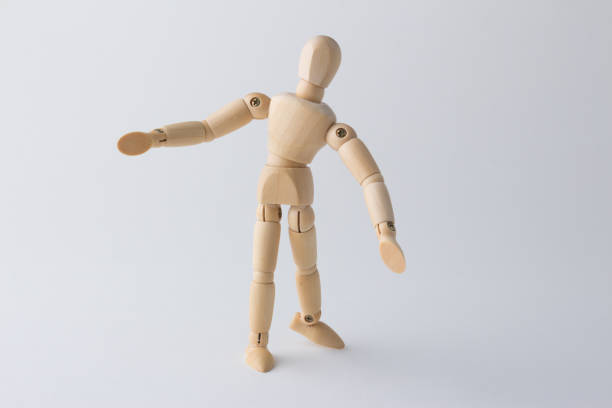 istock Wooden mannequin  looking up 1085327688