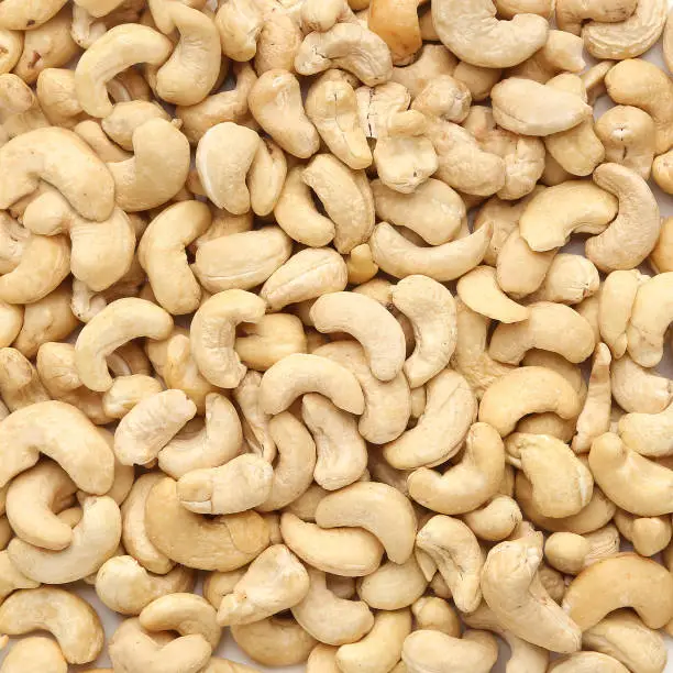 Cashew nuts as background, healthy food, closeup, top view