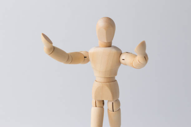 istock Wooden figure doll with open arms 1085330222