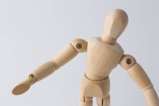 istock Wooden mannequin looking up 1085333508