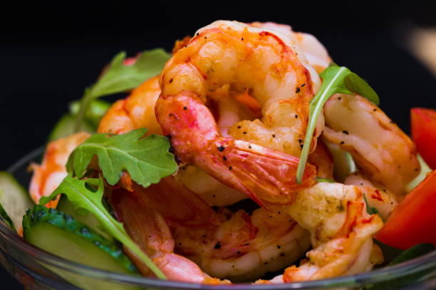 istock Food. Langoustines salad, black background 1085335980