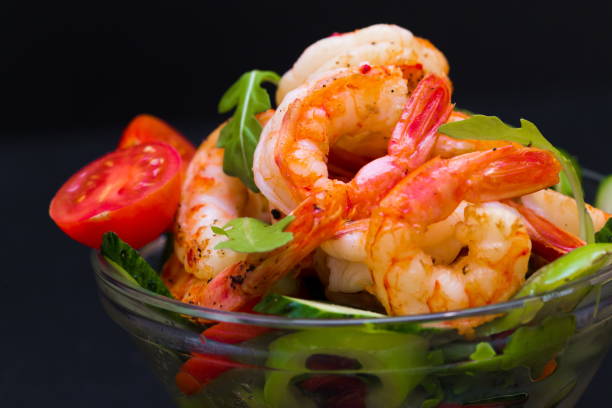 istock Food. Langoustines salad, black background 1085336094