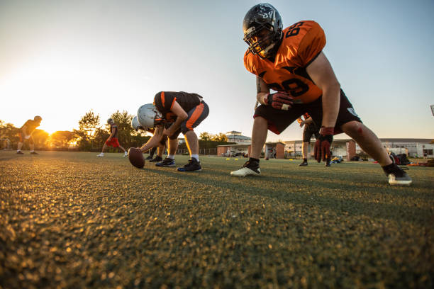istock Active Players On American Football Game 1085336744