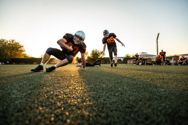 istock Active Players On American Football Game 1085336754