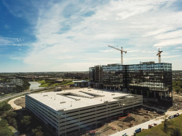 istock Top view building under construction with working crane North of Dallas, Texas 1085339708